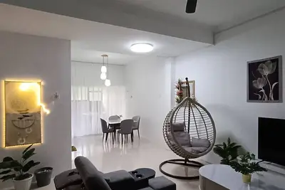 Image de Cozy 4br homestay in Tambun, Ipoh—Wi-Fi, kitchen, near attractions. Family-friendly