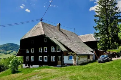 Image de Maison de vacances 'Black Forest Woods' avec vue sur la montagne, terrasse privée et Wi-Fi
