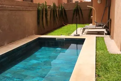 Image de Belle Villa avec Piscine Privée  à 15 minutes du Centre-Ville
