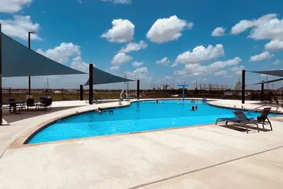 Image de New house/Lackland Air Force Base at 9 min /3 bdr /King size/Pool/Grill/