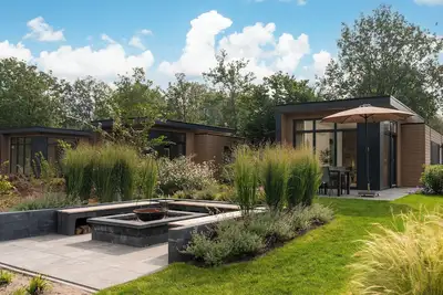 Image de Luxurious Cannenburch Deluxe, atmospheric outdoor area and lounge with outdoor fireplace.