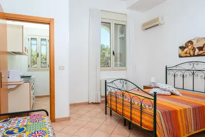 Image de Appartement 'Angeli Nel Salento - Casa Vacanza 3' avec Terrasse Privée, Wi-Fi et Climatisation