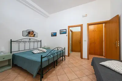 Image de Appartement 'Angeli Nel Salento - Casa Vacanza 1' avec Terrasse Commune, Wi-Fi et Climatisation