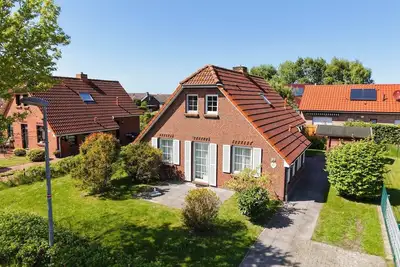Image de Detached vacation home in Nessmersiel (near Deich): own garden & wallbox