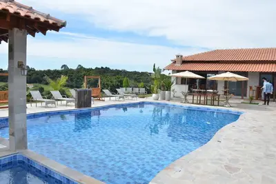 Image de Chácara completa 5 quartos piscina, sauna, jacuzzi, churrasqueira e fogão lenha