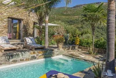 Image de Casa Di A Scala, villa haut de gamme avec piscine chauffée, jacuzzi, hammam, salle de sport à Erbalunga