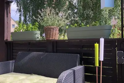 Image de Apartment over 2 floors, with yard+garden+parking space, ideal f. Vacationers with child and / or cone