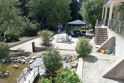 Image de Maison avec jardin/terrasse face à la foret