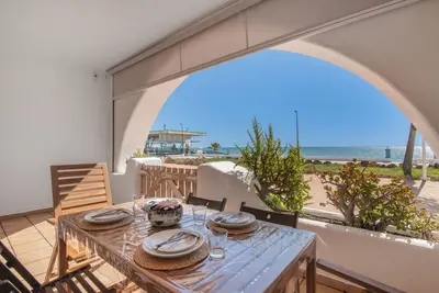 Image de Maison de vacances 'Primera Linea En Matalascañas' avec vue sur la mer, Wi-Fi et climatisation