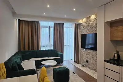 Image de Comfortable 2-Bedroom Apartment with Living Area Perfect for Relaxing by the Sea