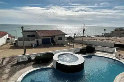 Image de Buenos Aires Villa 6 Oceanview Pool, Rooftop Bbq Station & Steps to the Beach