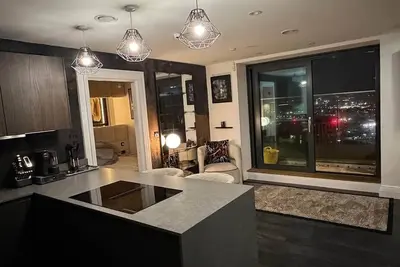 Image de Stylish Penthouse in the Heart of the City – Breathtaking Views