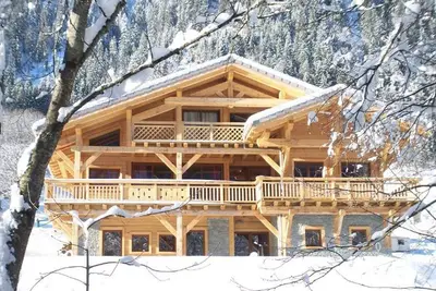 Image de Chalet spacieux pour 14 personnes avec WiFi, animaux admis et parking à Châtel