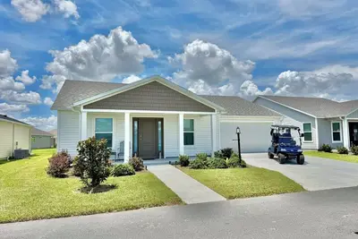 Image de The Villages 2/2 + Workout Room and Golf Cart in The Village of Moultrie Creek