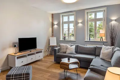 Image de Appartement '4 Putlitz' avec terrasse privée, jardin commun et Wi-Fi