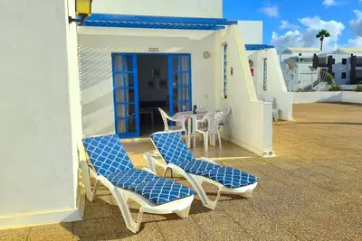 Image de Atalaya Complex, central Puerto del Carmen, sunny terrace with sunloungers