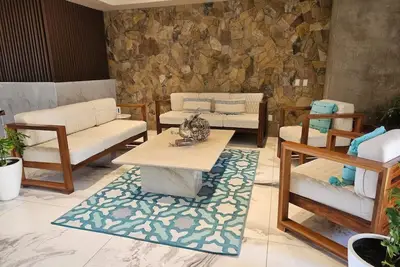 Luxury Beachfront Escape with Rooftop Pool & Views