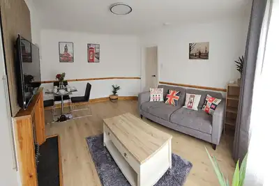 Image de EcuaStay New Luxurious 4 Bedroom Home with Garden and parking