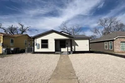 Image de Spacious 4br/2ba Home Minutes from Downtown Dallas/Yard/Parking available.