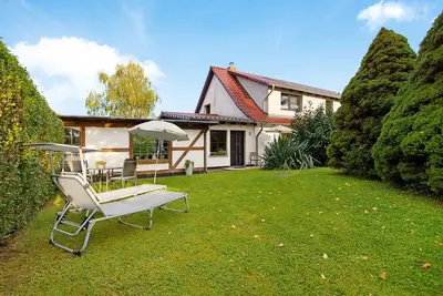 Image de Appartement 'To Hus' avec terrasse privée, jardin privé et Wi-Fi