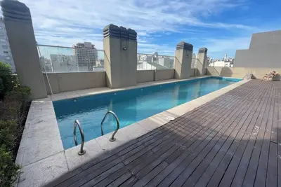 Image de Apart Suites avec pileta et parrilla