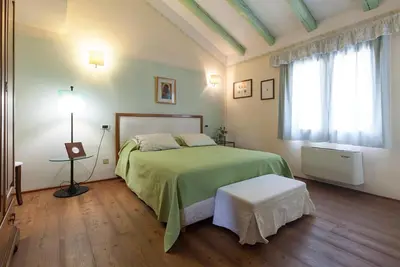Image de Chambre 'Verde' avec jardin partagé, Wi-Fi et climatisation
