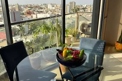 Image de Curator’s Artistic Retreat • Balcony w Breathtaking Views of Dakar • WiFi • Safe