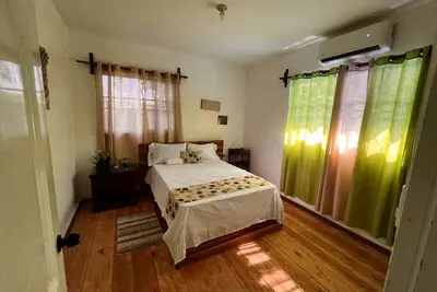 Image de Spacious 6-bedroom villa in Tranquil Monseñor Nouel with Ac