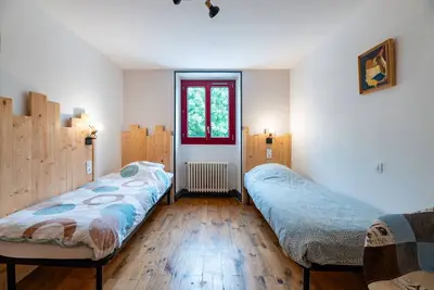 Image de Chambre 'Les Carlines' avec vue sur la montagne, terrasse partagée et Wi-Fi