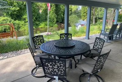 Image de Riverfront Escape in Downtown • Relax on the Covered Patio with the Family