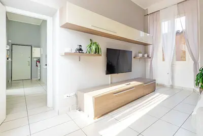 Image de Situated between lake and mountains a spacious one-bedroom apartment elegant and modern