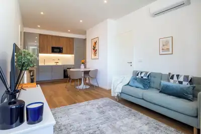 Image de Sleek and Modern Flat w/ Private Garage by HostWise