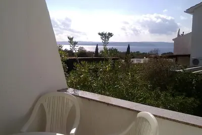 Image de Appartement d'une chambre avec la terrasse et la vue sur le mer Punat, Krk (A-24812-a)