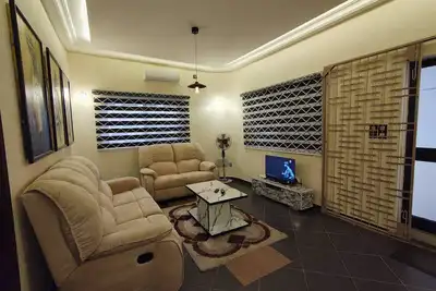 Image de Chambre Exécutive avec Lit King-Size à Akpakpa Cotonou Bénin