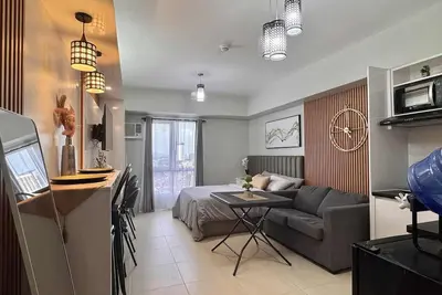 Image de Cozy and spacious condo with Ac in vibrant It Park, Cebu City