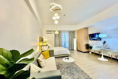 Image de Cozy 1-bedroom apartment near Naia Airport in enjoyable Bgc Taguig