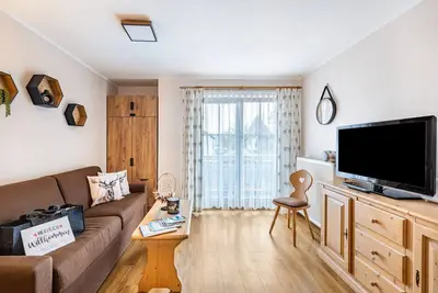 Image de Appartement 'Brünnstein- N° 27' avec vue sur la montagne, piscine commune et sauna