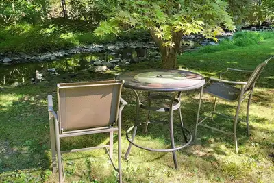 Image de House on the Dingmans Creek. Cozy, quiet and relaxing. Close to Child's park.