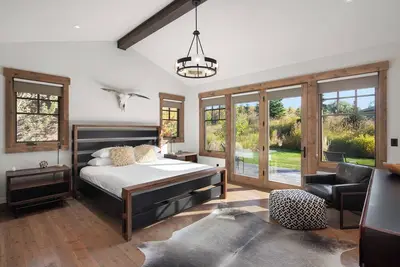 Image de Bespoke Whitefish Home | Lakeside Trails, Boating by Day & Fireplace Evening