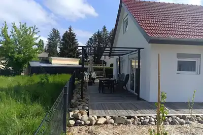 Image de Maison de vacances 'Ferienhaus Schw Agnes' avec vue sur le lac, terrasse privée et Wi-Fi