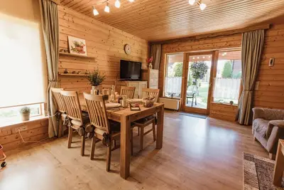 Image de Has-37 - Semi-detached house on the edge of the forest for families - wooden holiday homes in the