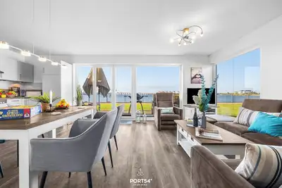 Image de Carpe Diem - directly on the water, terrace, bathtub, infrared sauna, washing machine