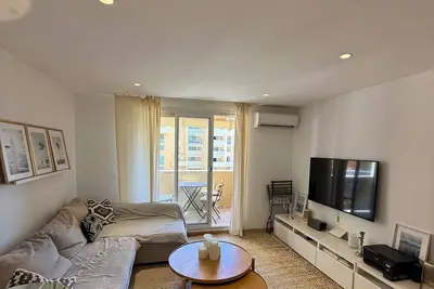 Image de A pied de la Place des Lices, duplex 2 chambres avec balcon, résidence récente