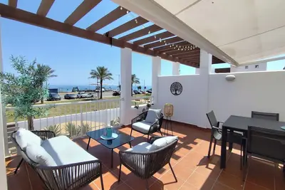 Image de Beachfront Apartment with Wifi, Swimming Pool and International Tv Channels