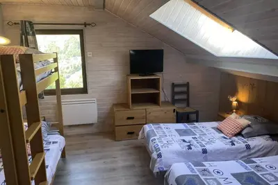 Image de 1er étage, balcon, cheminée ou poêle à bois, parking, casier à ski, 91m², Valloire