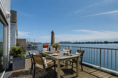 Image de Wiggers Hüs - Water view, infrared cabin, whirlpool tub, washing machine, parkin