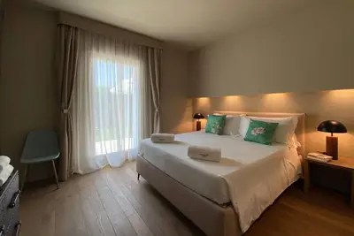 Image de Appartement 'Time To Relax Resort - Melograno' avec piscine partagée, Wi-Fi et climatisation