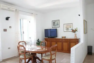 Image de Comfortable 75 sqm apartment, accommodating up to 3 people, located on the second floor of a building without an elevator. The property is located in Grumo Appula, a typical inland village in Puglia, rich in history and equipped with every comfort and ser