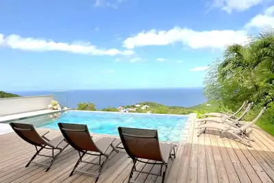 Image de Villa Manitou, Vue mer et piscine façon pierre de Bali