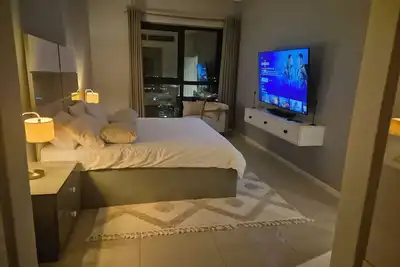 Image de Cozy 1-bedroom apartment in lovely Gaborone with Ac, fitness room